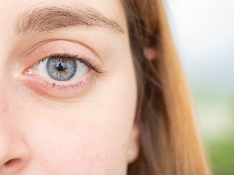 Young woman with wide open eye