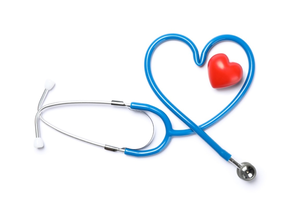 Stethoscope and red heart isolated on white background