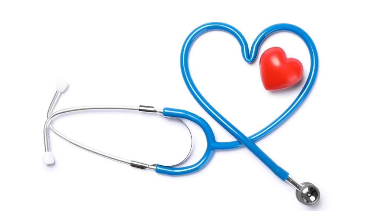 Stethoscope and red heart isolated on white background