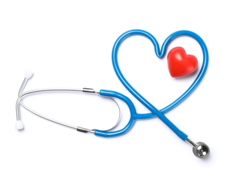 Stethoscope and red heart isolated on white background